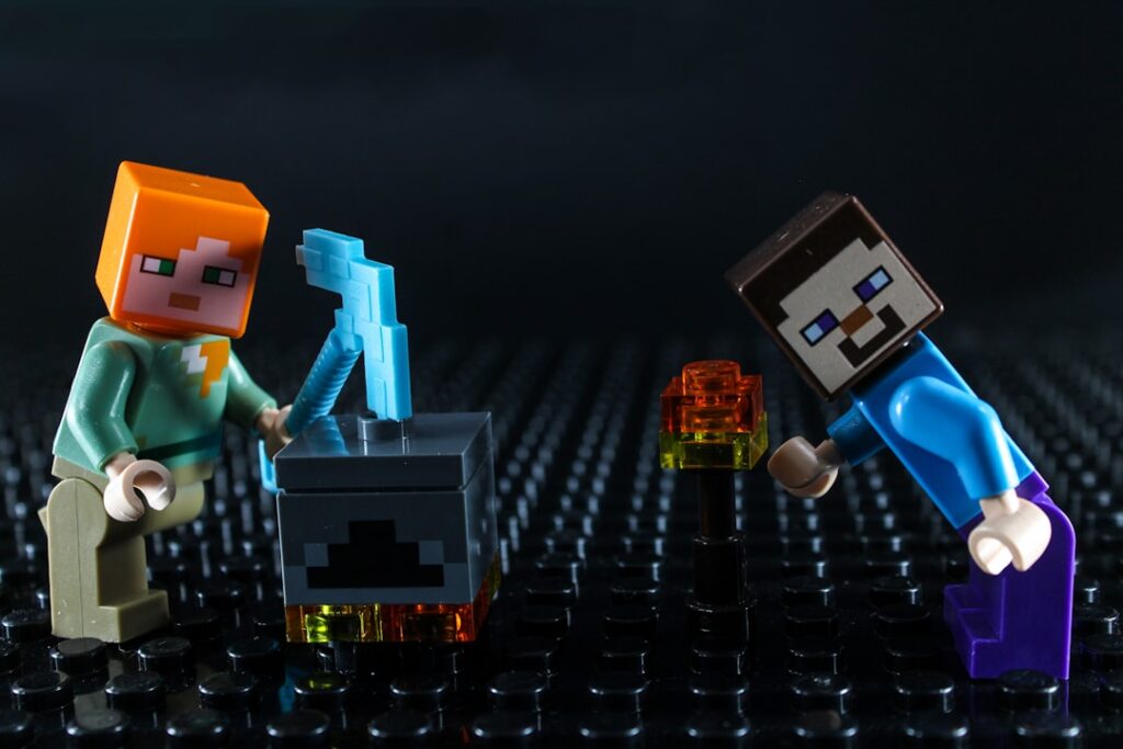 Two minecraft lego figures with crafting table
